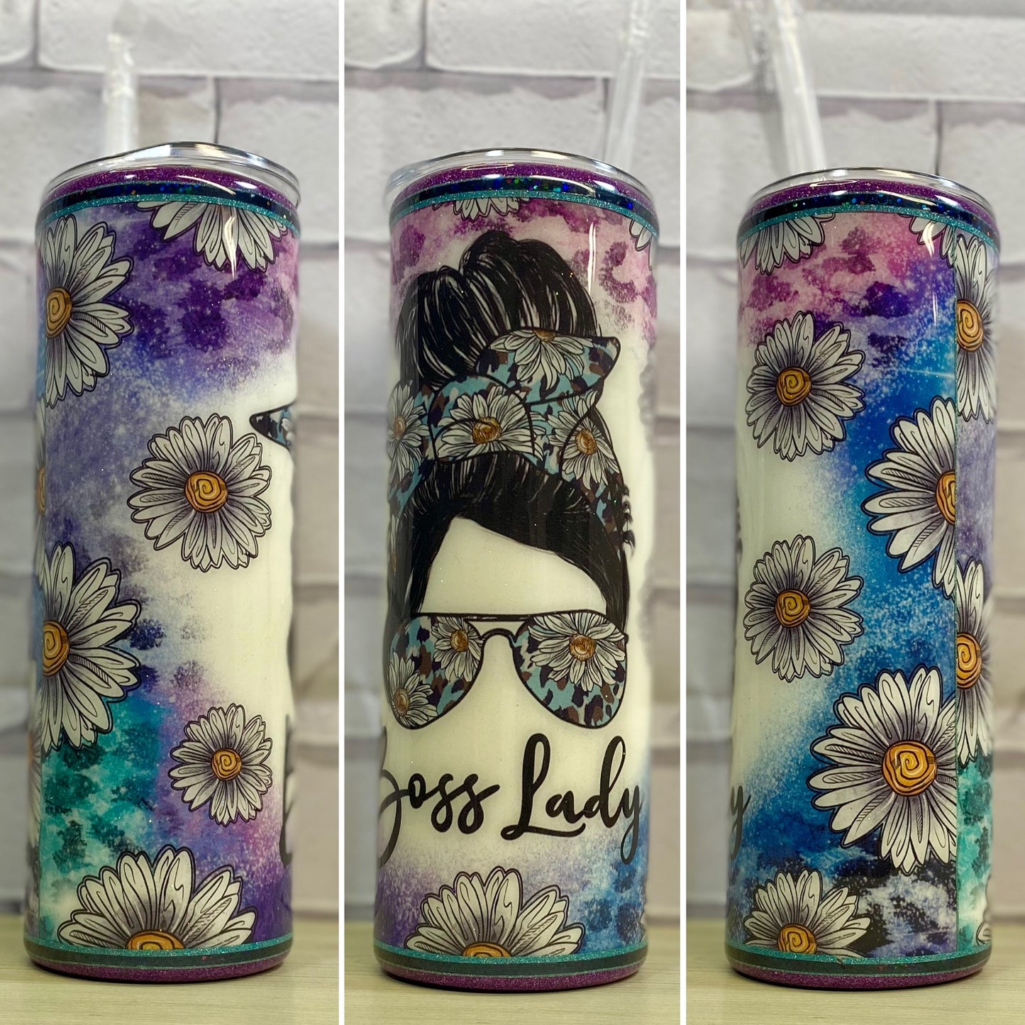 A stainless steel tumbler with a floral and sunglasses design, labeled 'BOSS LADY'.