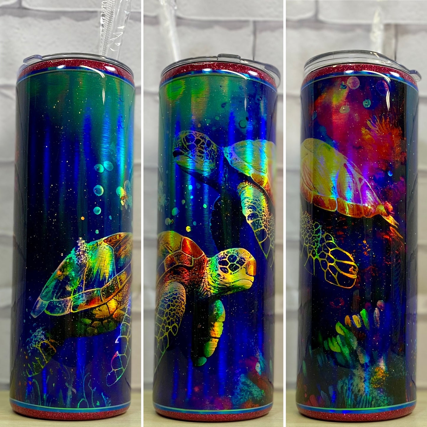 A stainless steel tumbler with a colorful sea turtle design and multicolored holographic background.