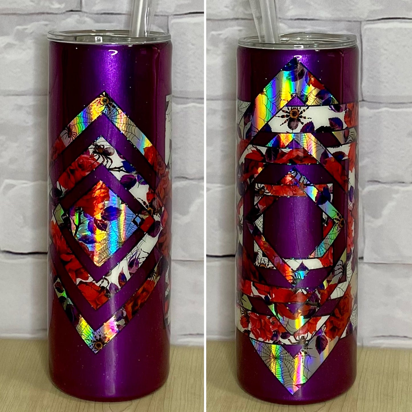 A purple 20oz stainless steel tumbler with a geometric pattern and multicolored floral designs.